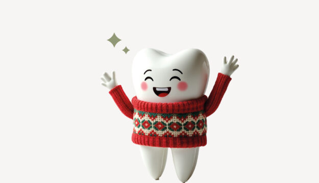 Eine Grafik zeigt einen fröhlich jubelnden Zahn im roten Weihnachtspullover